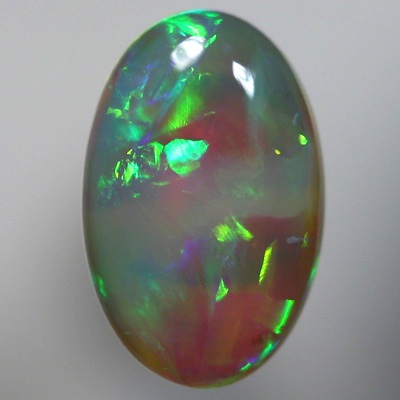 SOLID CRYSTAL OPAL Large bright chasing rolling flashes of rich orange and green